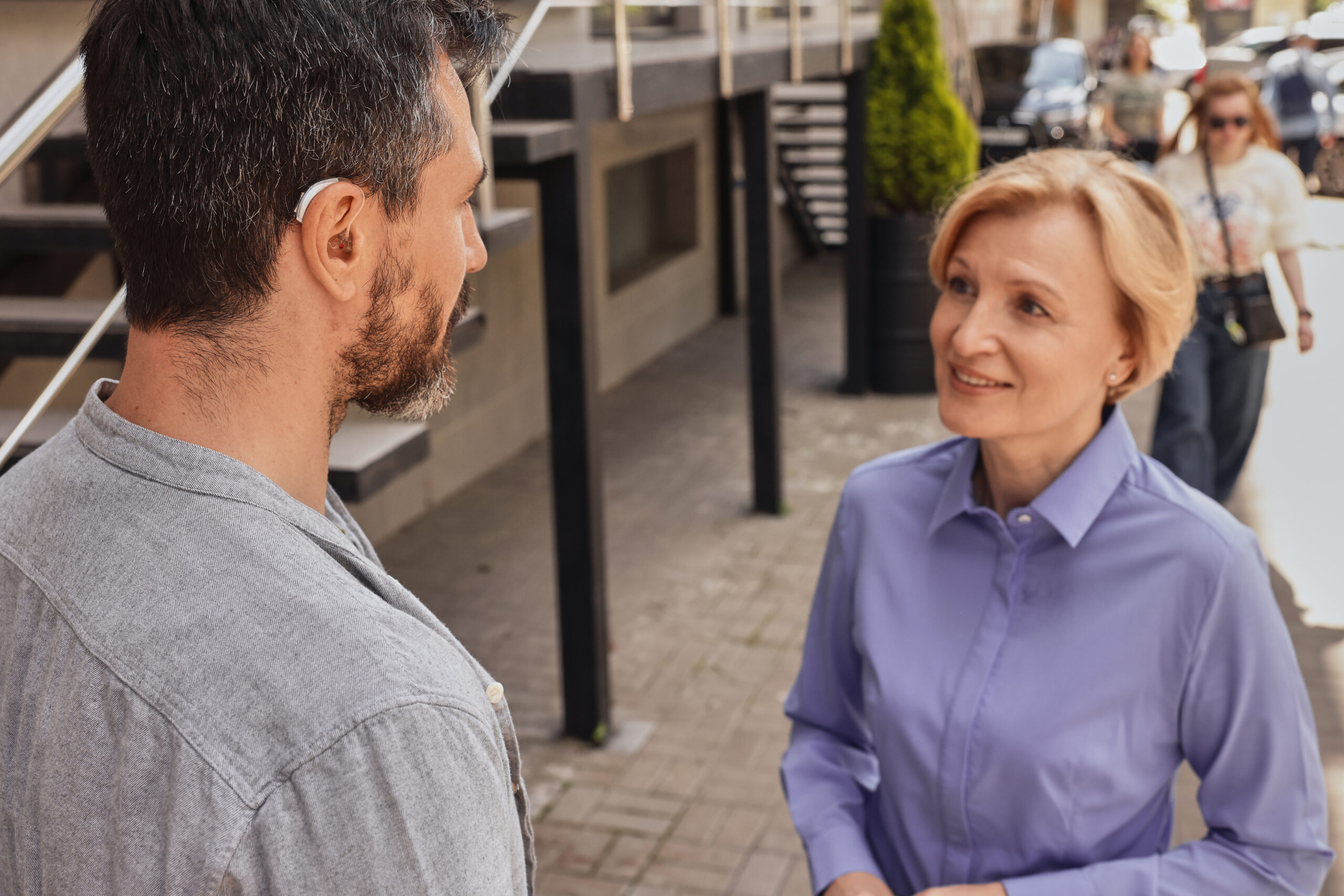 Sales professional talking to a customer during a direct outreach.
